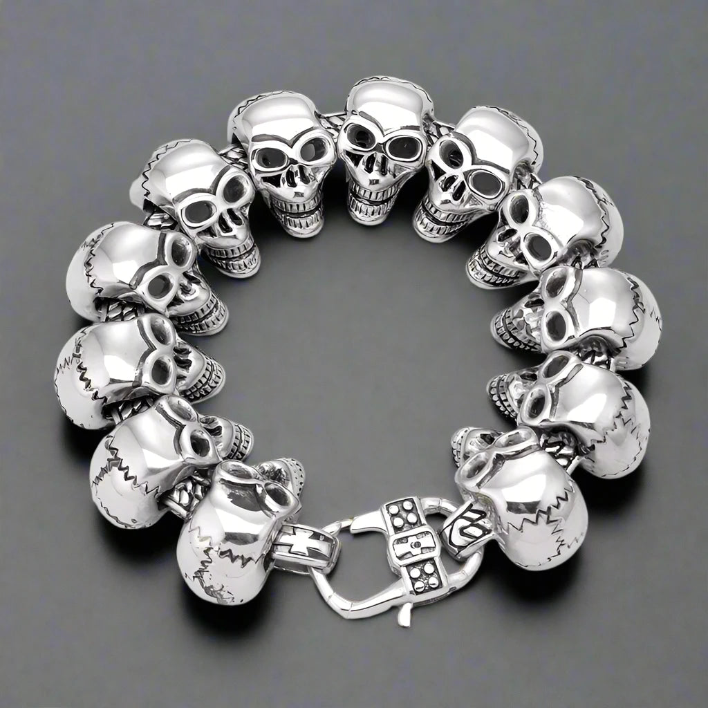 Multiple skull silver bracelet containing fine intricate detail