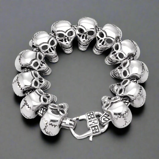 Multiple skull silver bracelet containing fine intricate detail