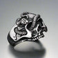 a steel skull ring wrapped by a snake