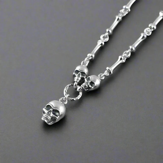 Stunning 925 sterling silver skull necklace using bones as the chain