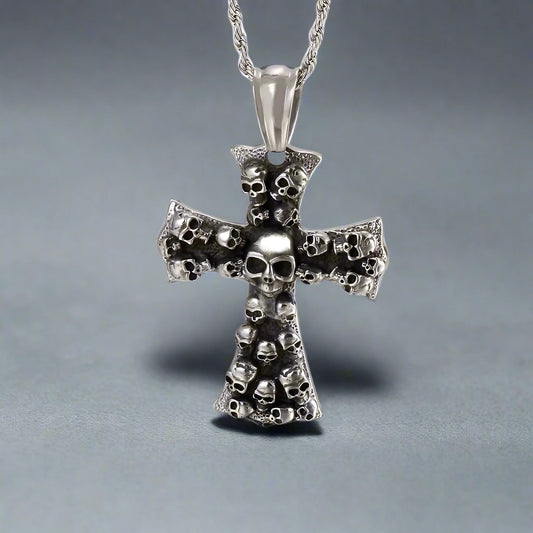 Multiple silver skulls cross necklace